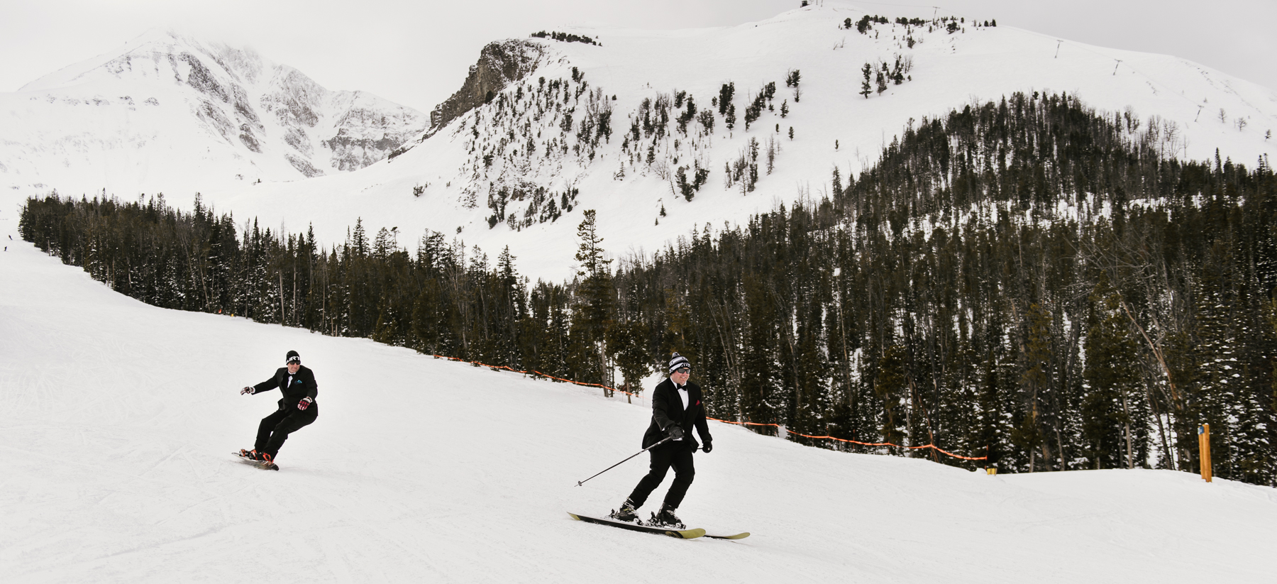 groomsmen skiing down big sky