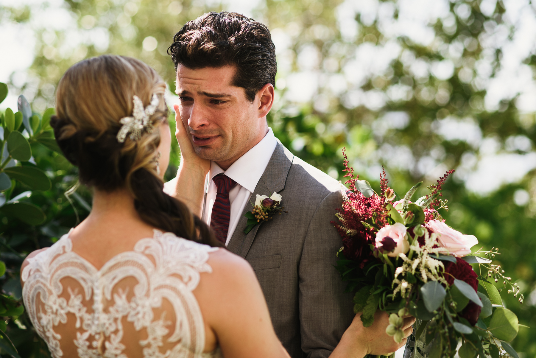 florida destination wedding first look groom crying