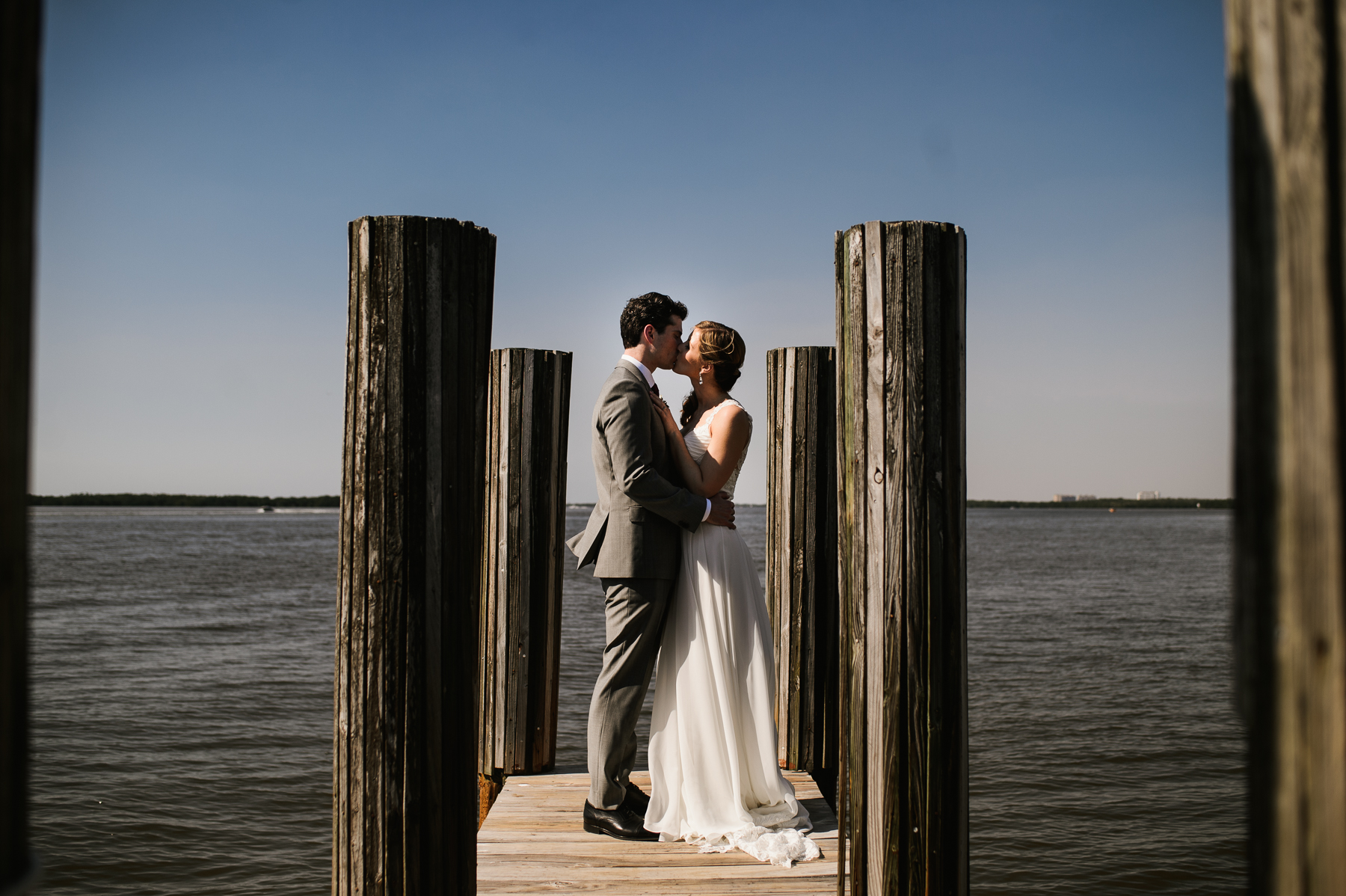 sanibel marriott pier wedding kiss couple