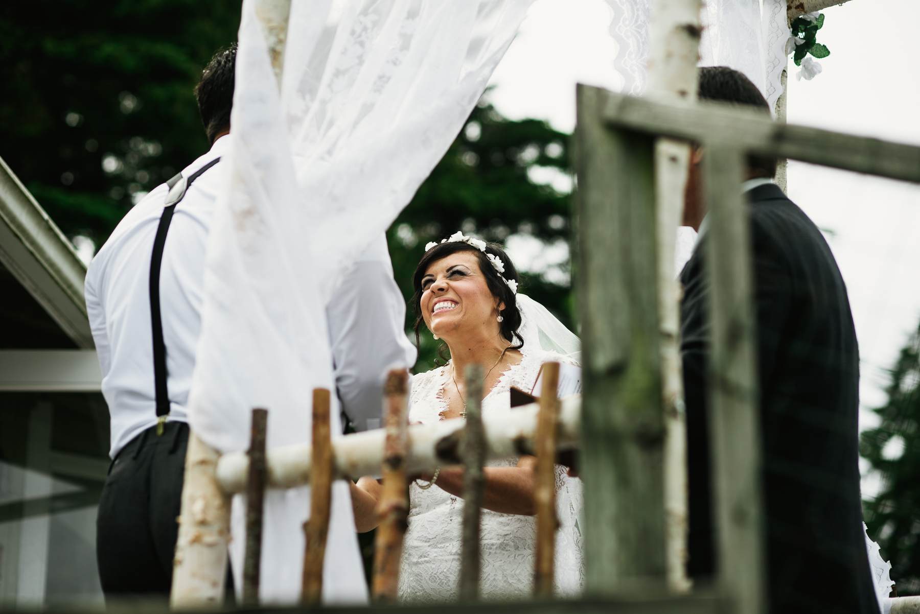 bride smiling during ceremony