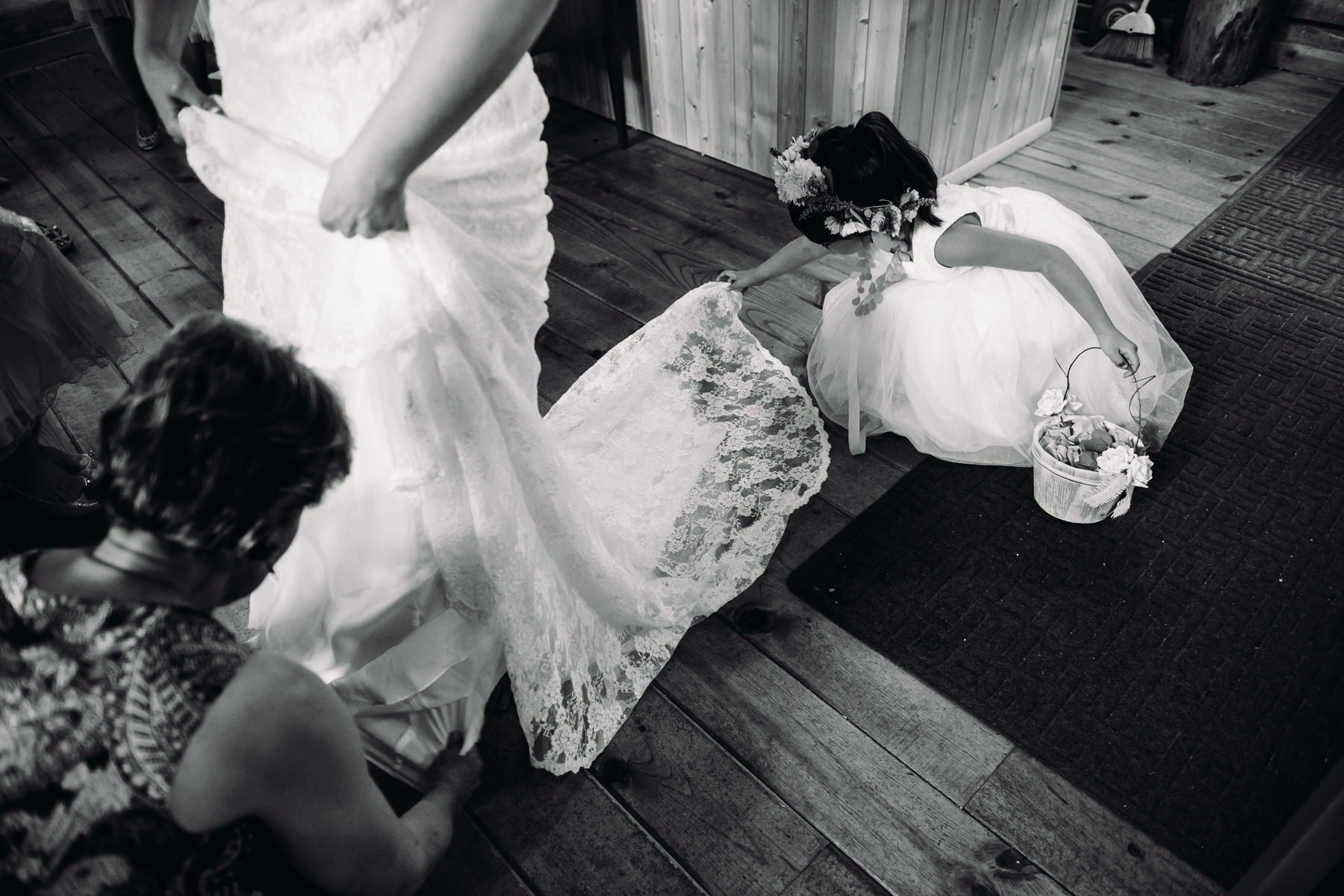 Trinity Tree Farm flower girl helping with dress