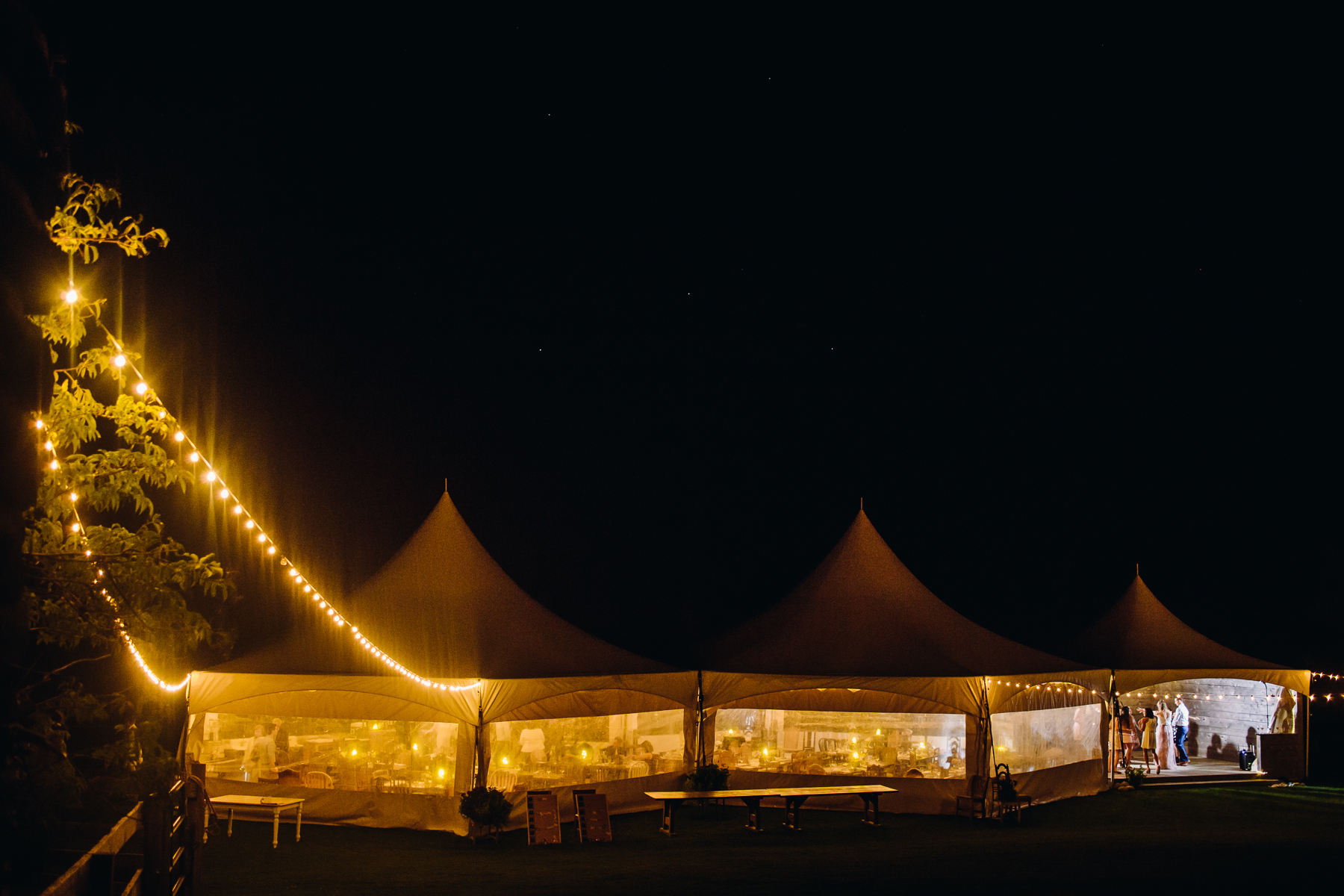 brown family homestead tent at night