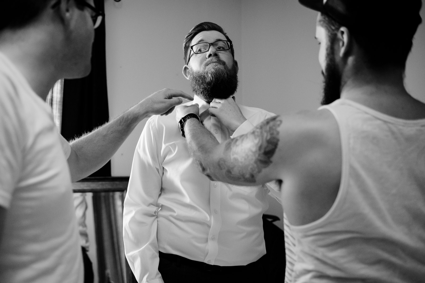 groomsmen getting ready moments