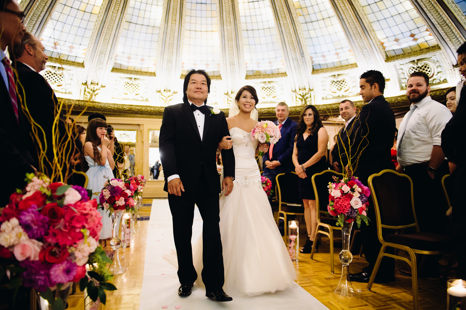 father and daughter walking down aisle arctic club