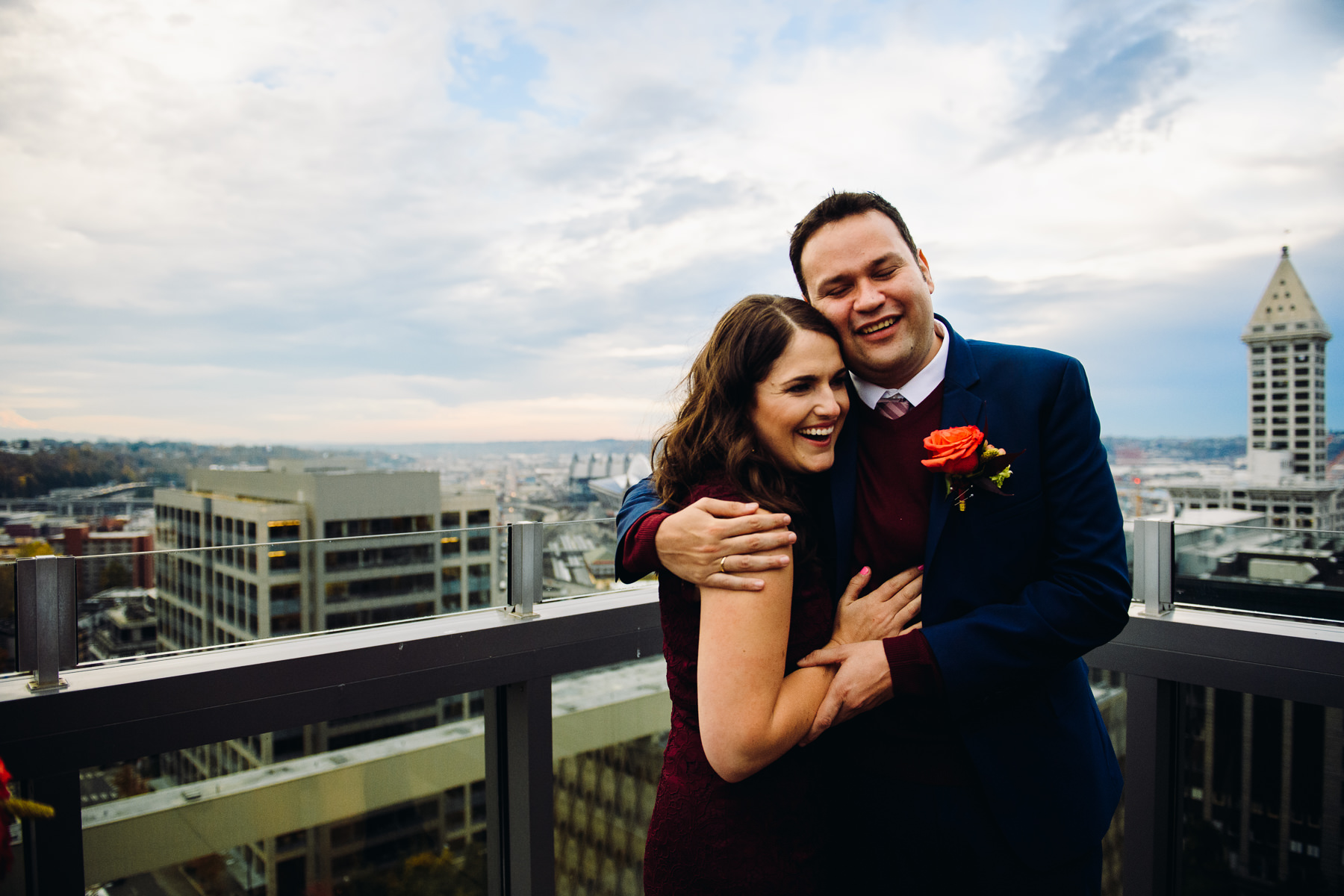 couple embrace wedding photos