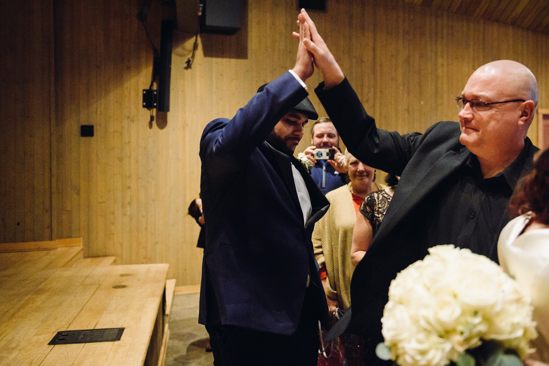 sleeping lady resort groom and father of bride high five