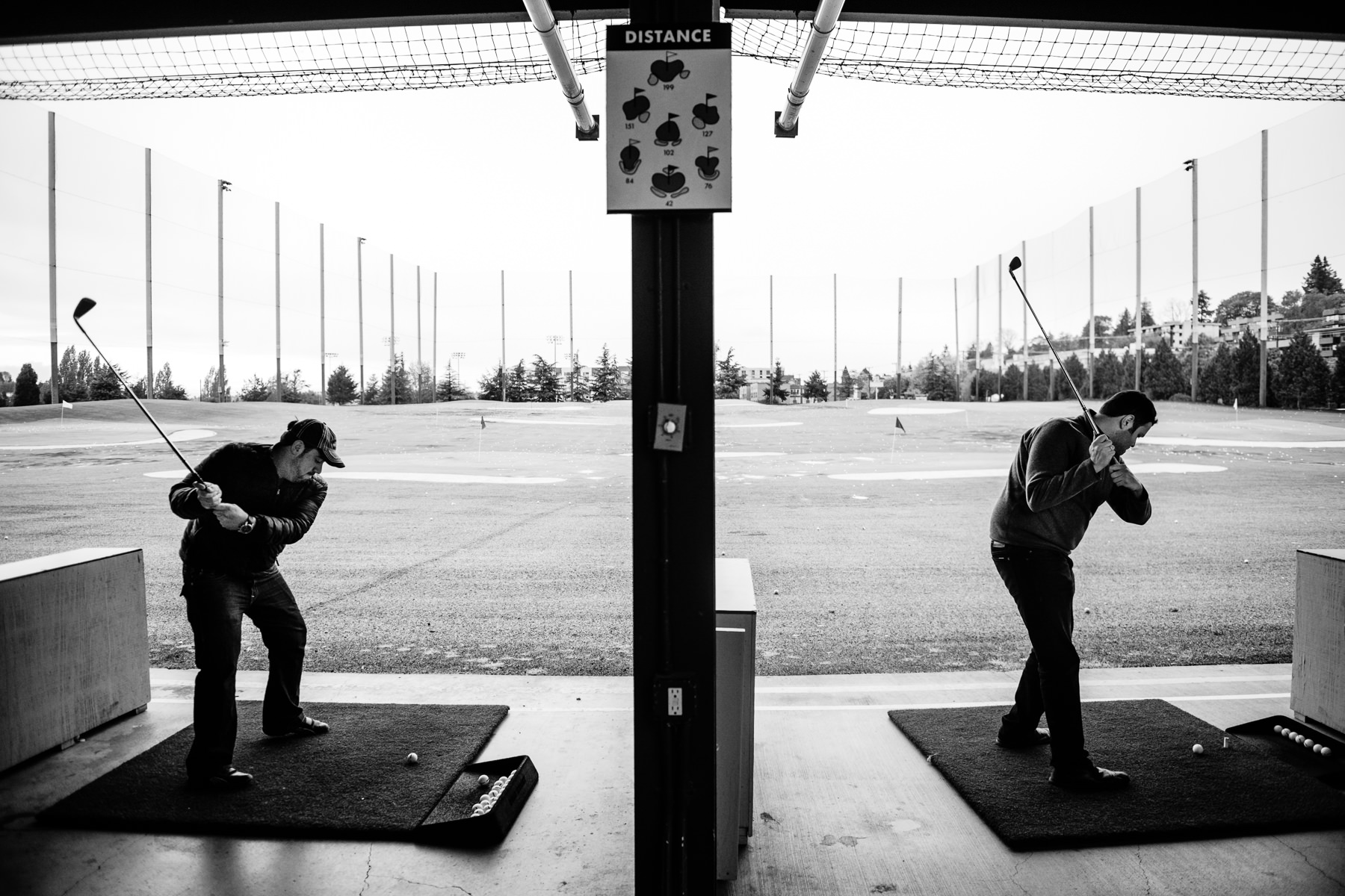 Inner Bay Golf range groomsmen wedding photo