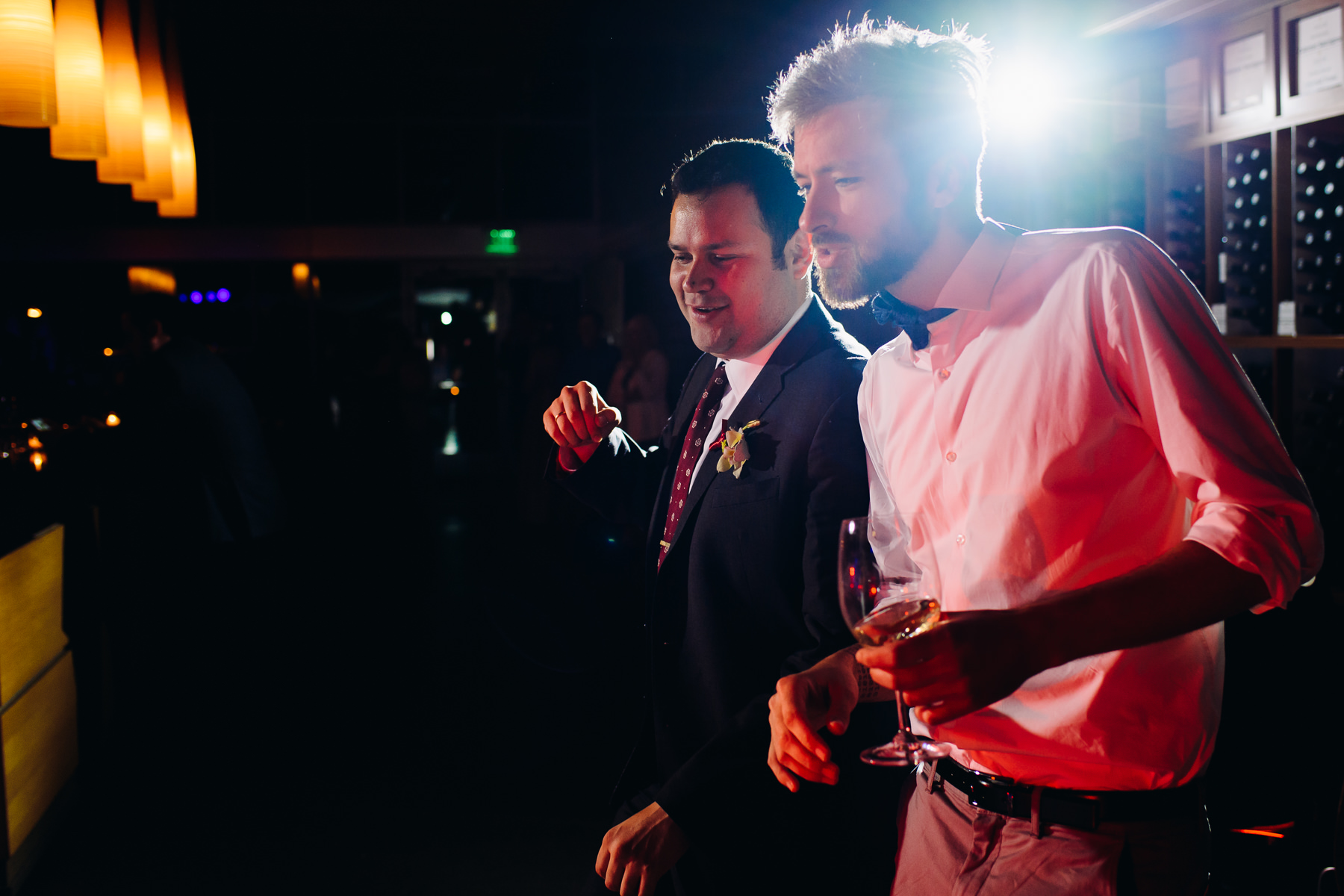 groom and friend dancing to live band 