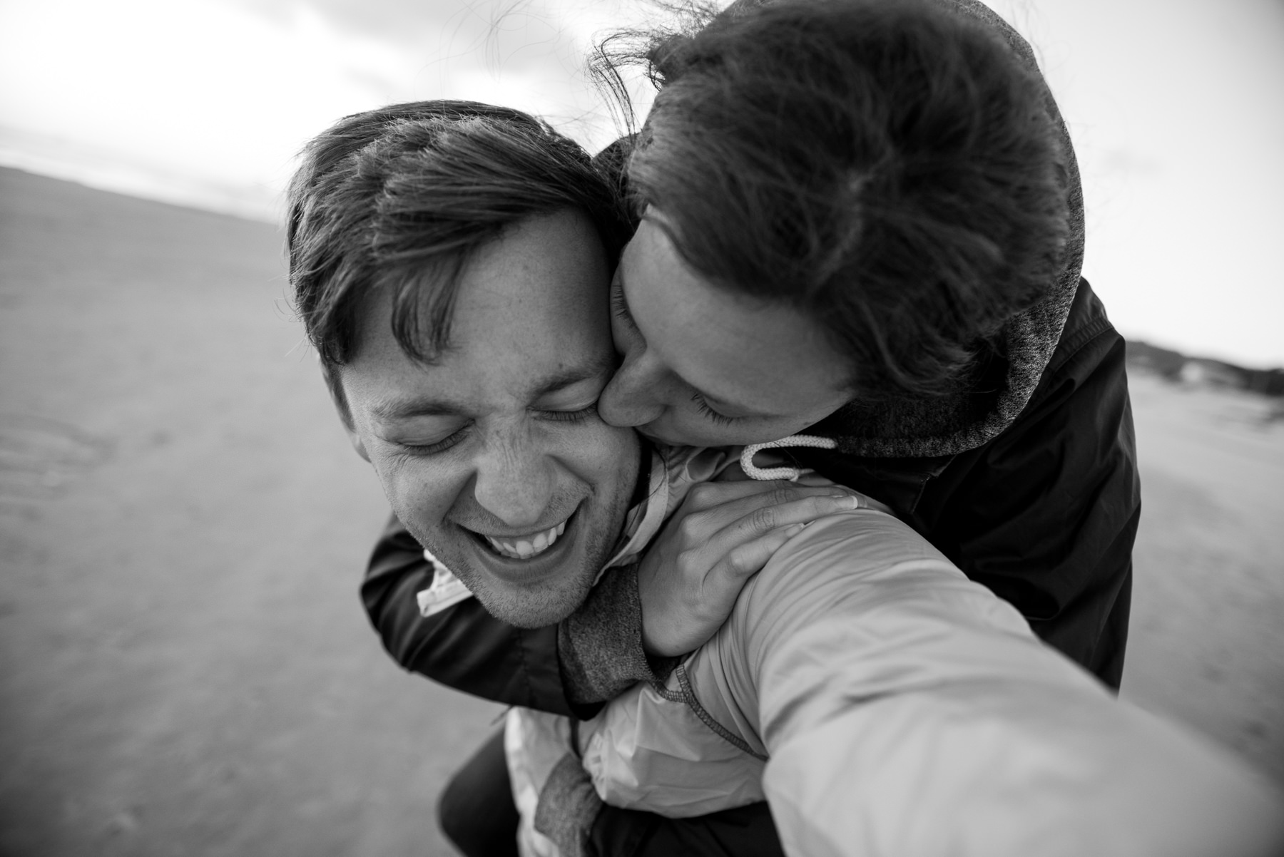 fun couple on cannon beach