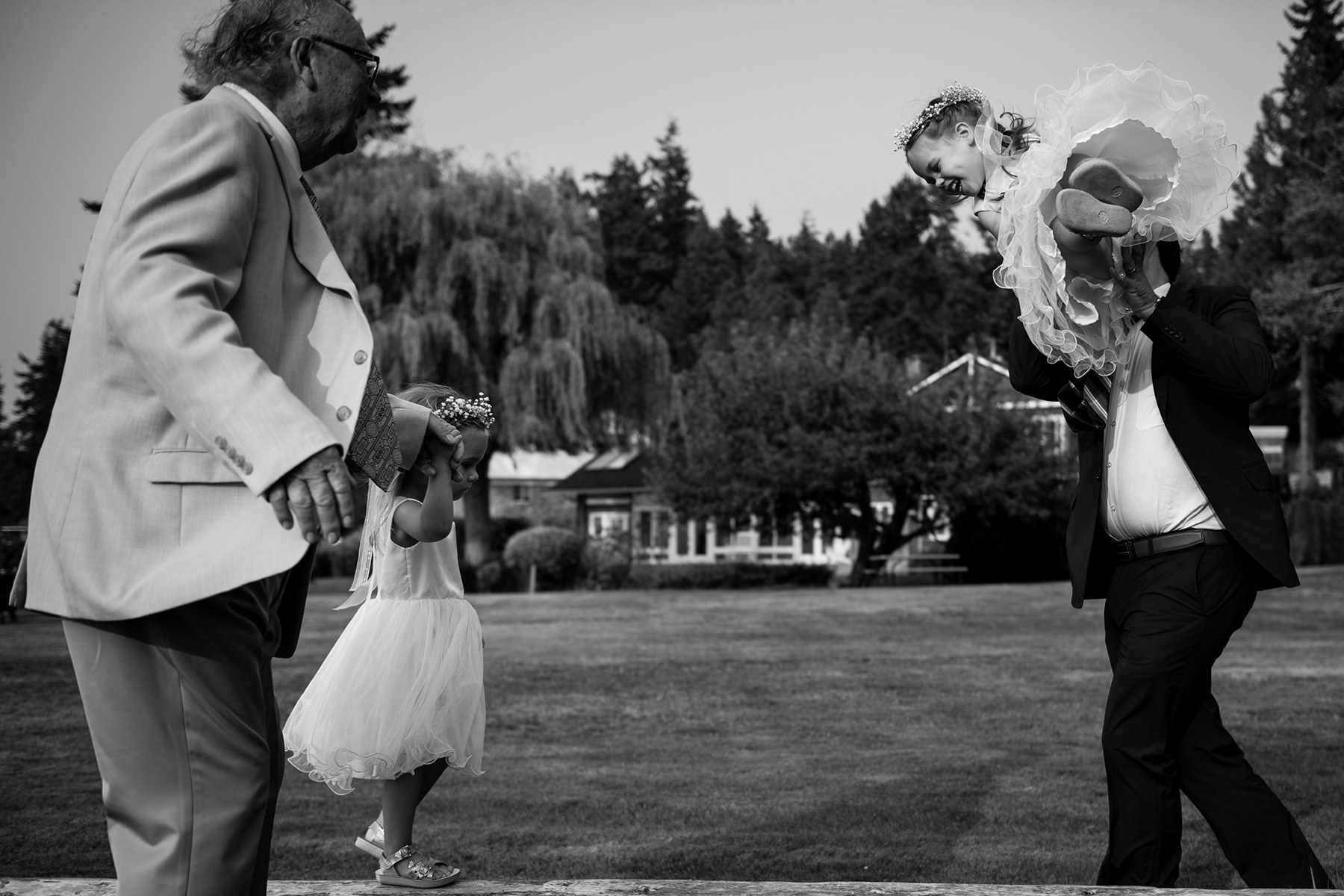 flower girls playing with guests