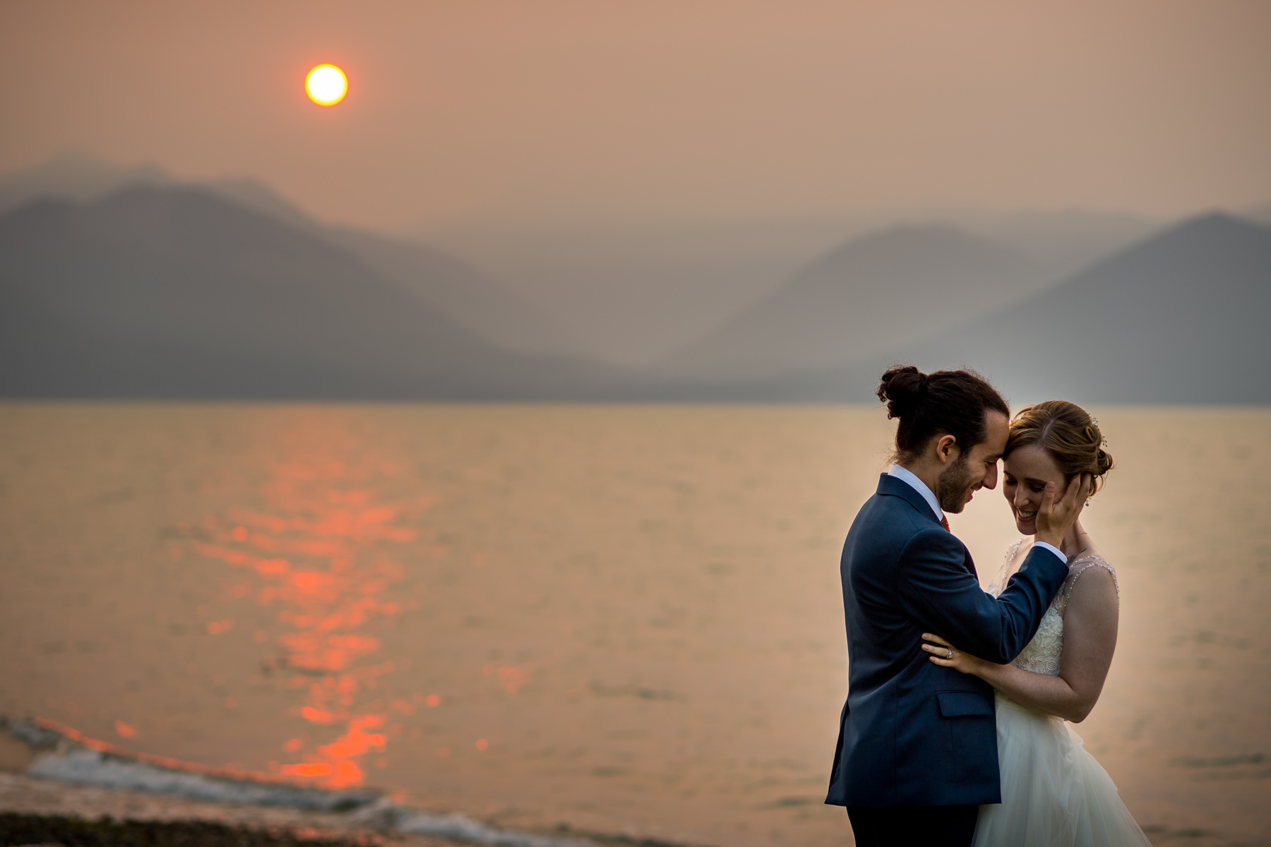 sweet moment during creative wedding portraits