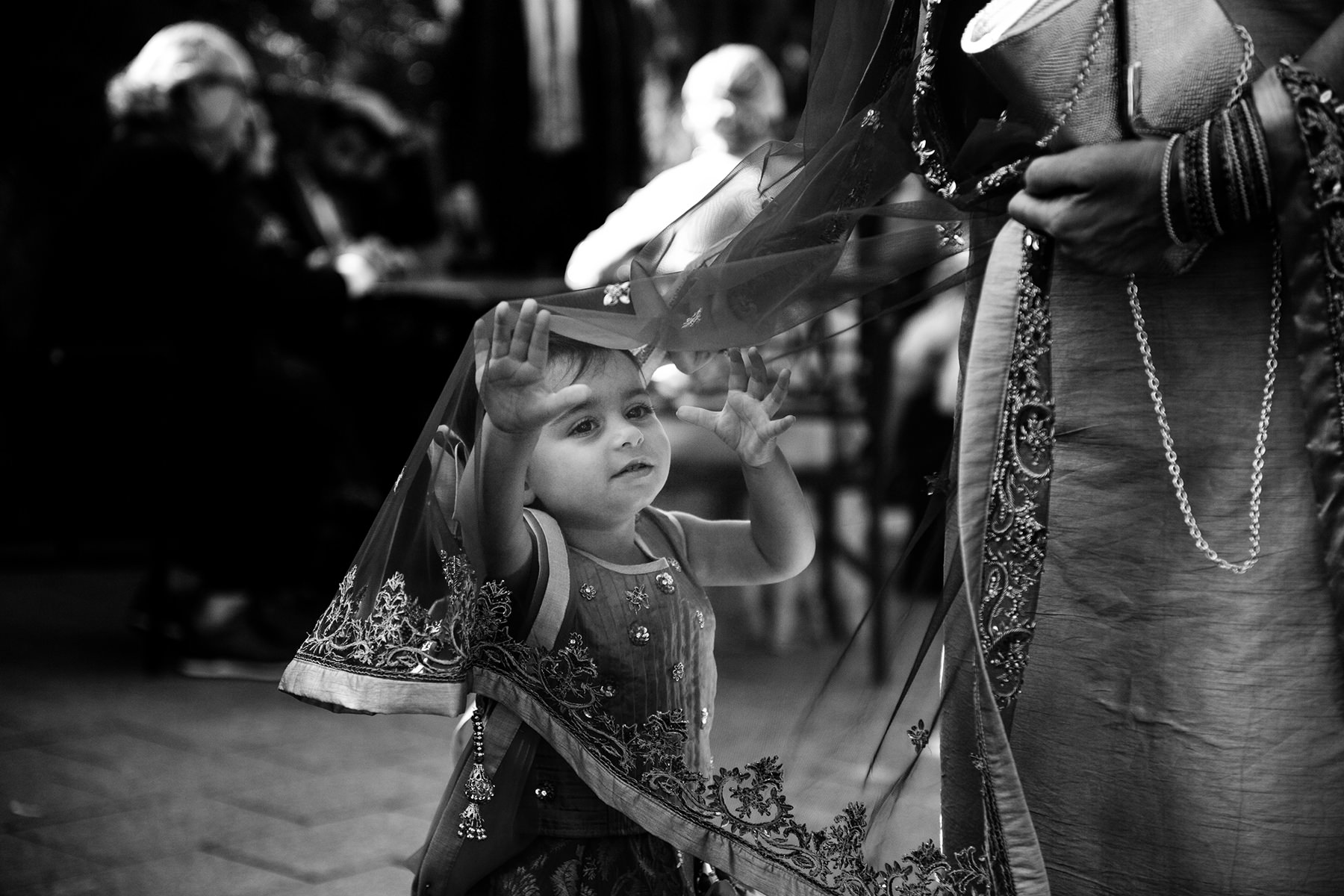 flower girl getting stuck in mom's dress